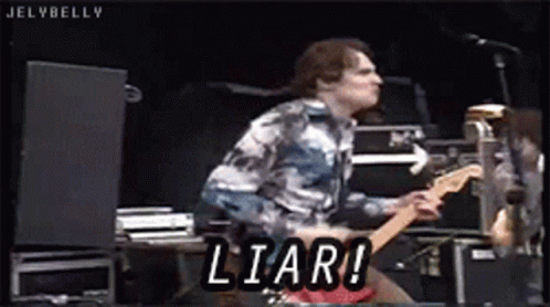 Man Playing Guitar On Stage With Liar GIF