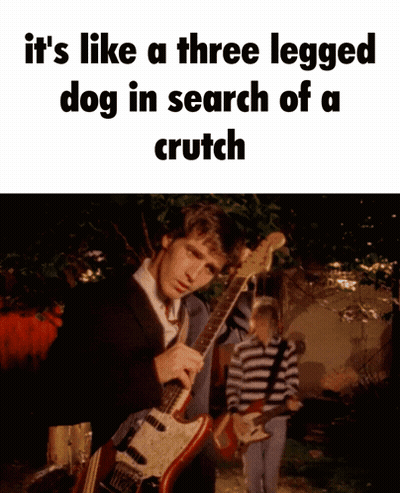 Man Playing Guitar Saying It's Like A Three Legged Dog In Search Of A Crutch GIF