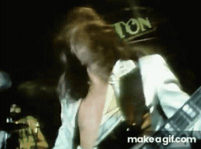 Man Playing Guitar Shirtless On Stage GIF