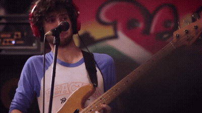 Man Playing Guitar Singing Peach Shirt GIF