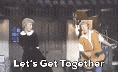Man Playing Guitar While Woman Dancing GIF