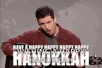 Man Playing Guitar Wishing A Happy Hanukkah GIF