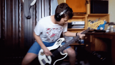 Man Playing Guitar With Headphones GIF
