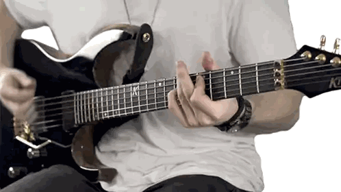 Man Playing Guitar With K Sticker