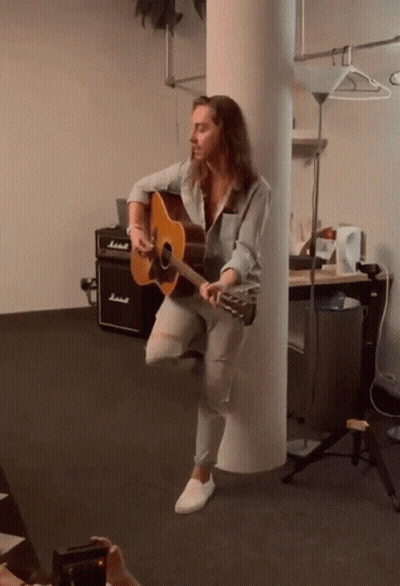 Man Playing Guitar With Marshall Amplifier GIF