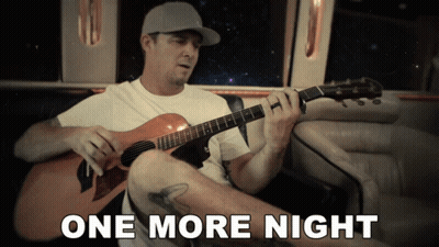 Man Playing Guitar With One More Night Behind GIF