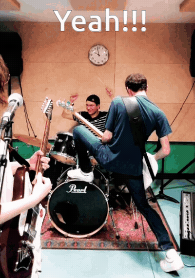 Man Playing Guitar With Pearl Drum Set GIF
