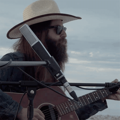 Man Playing Guitar With Sennheiser Microphone GIF