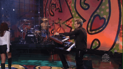 Man Playing Keyboard In Front Of Tama Drum Set GIF