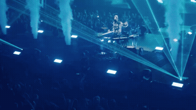 Man Playing Keyboard On Stage With Smoke GIF