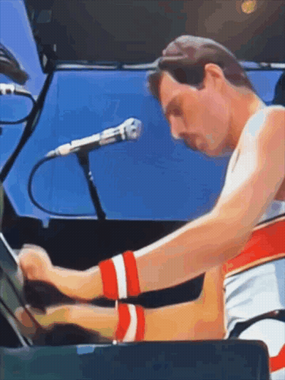 Man Playing Piano With Microphone GIF