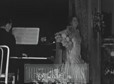 Man Playing Piano Woman Singing GIF