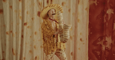 Man Playing Saxophone Made Of Tortilla Chips GIF