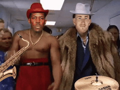 Man Playing Saxophone Next To Man Playing Sabian Cymbal GIF