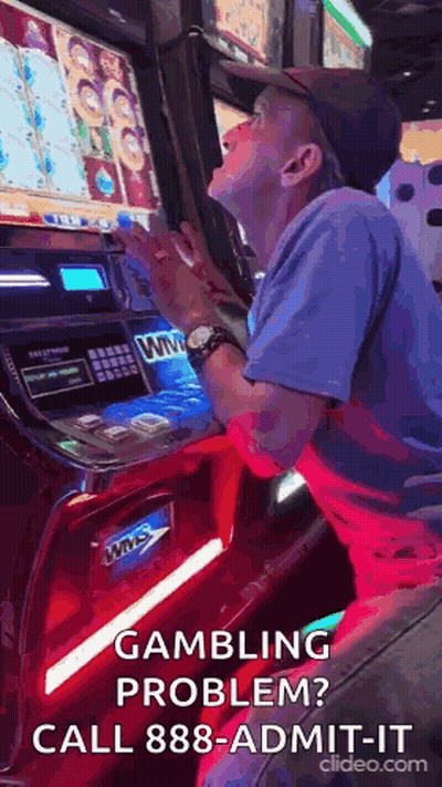 Man Playing Slot Machine GIF
