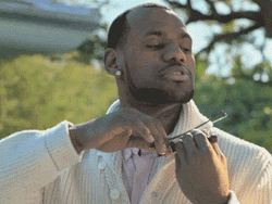 Man Playing Smallest Violin GIF