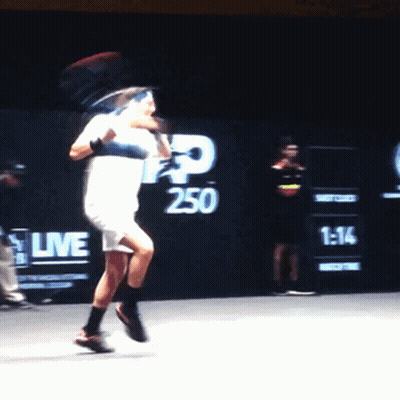 Man Playing Tennis In Front Of 250 Wall GIF