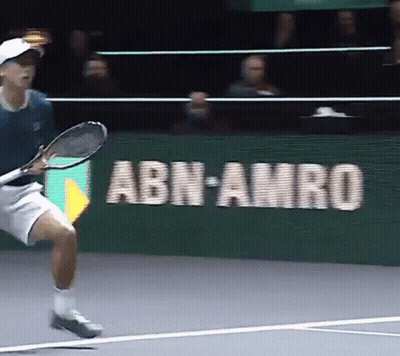 Man Playing Tennis In Front Of ABN AMRO Sign GIF