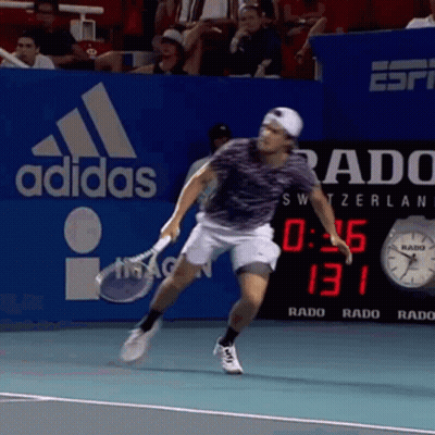 Man Playing Tennis In Front Of Adidas Sign GIF