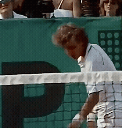 Man Playing Tennis In Front Of P Banner GIF