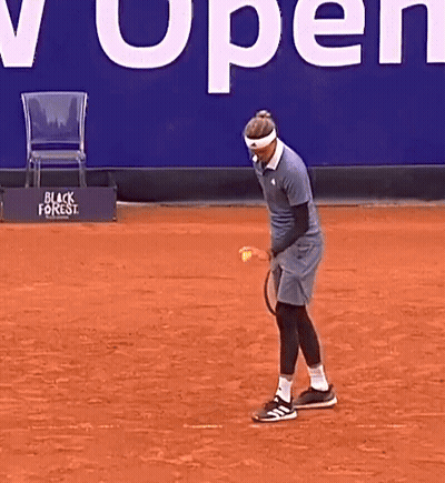 Man Playing Tennis In Front Of Sign Saying Open GIF