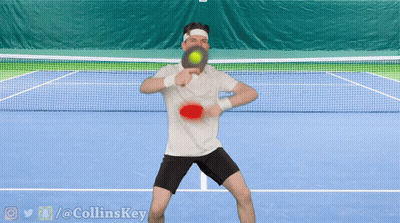 Man Playing Tennis On Blue Court With Twitter @ Collinskey Watermark GIF