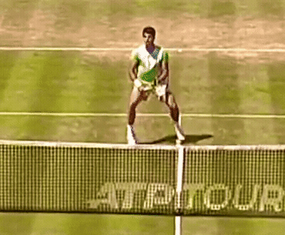 Man Playing Tennis On Court With AT&T Ad GIF