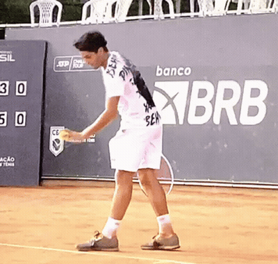 Man Playing Tennis With Banco Brb Banner GIF