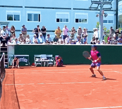 Man Playing Tennis With Perrier Sign GIF