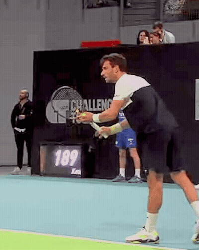 Man Playing Tennis With Racquet GIF