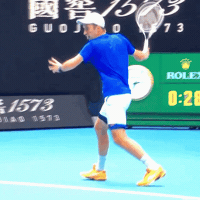 Man Playing Tennis With Rolex Ad GIF