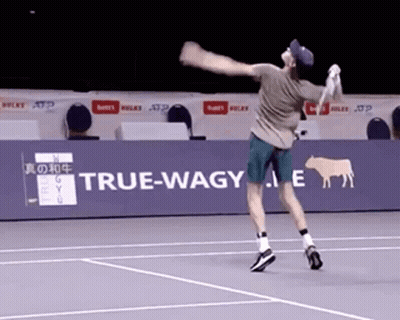Man Playing Tennis With True-Wagy Banner GIF