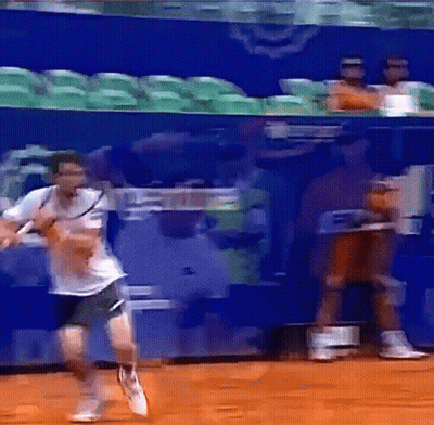 Man Playing Tennis With Watching Crowd GIF