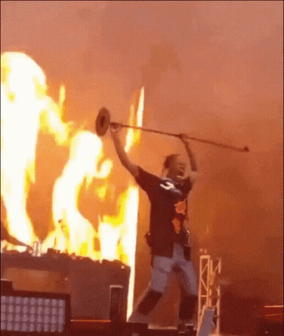 Man Playing Trumpet In Flaming Background GIF