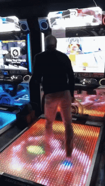 Man Playing Video Game Saying Raise Your Hands