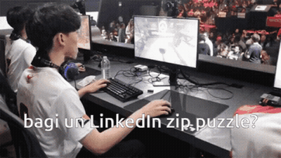 Man Playing Video Game With Bagi Um LinkedIn Zip Puzzle GIF