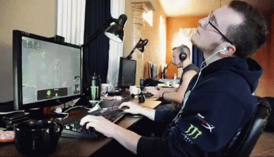 Man Playing Video Game With Headphones GIF