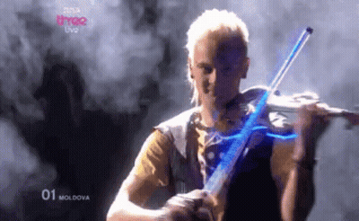 Man Playing Violin In Front Of BBC Three Live Screen GIF