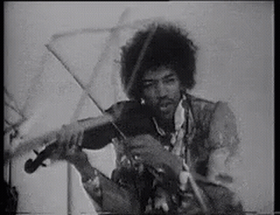 Man Playing Violin On Stage Black And White GIF