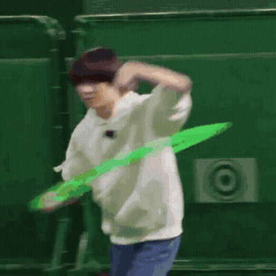 Man Playing With Green Hula Hoop GIF