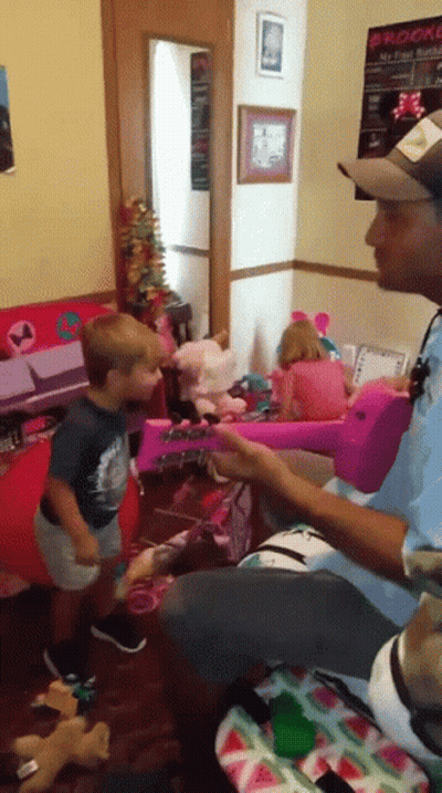 Man Playing With Two Children In Room With Brooke Poster GIF