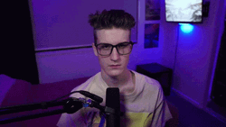 Man Podcasting Flex His Muscle GIF