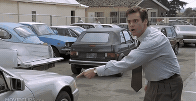 Man Pointing At Car In Parking Lot GIF