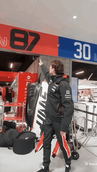 Man Pointing At Sign Saying 87 30 GIF