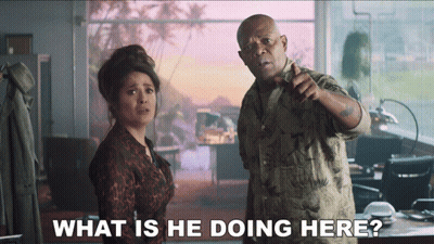 Man Pointing At Woman Asking What Is He Doing Here GIF