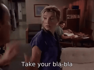 Man Pointing At Woman In Kitchen GIF