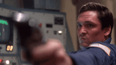 Man Pointing Gun At Camera With 09 GIF