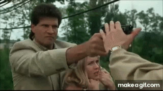 Man Pointing Gun At Woman GIF