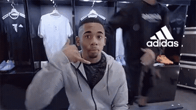 Man Pointing In Locker Room With Adidas Logo GIF