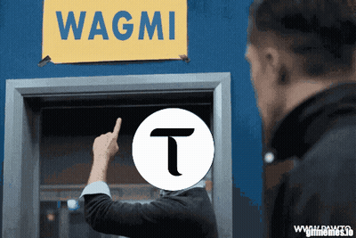 Man Pointing To Wagmi Sign GIF